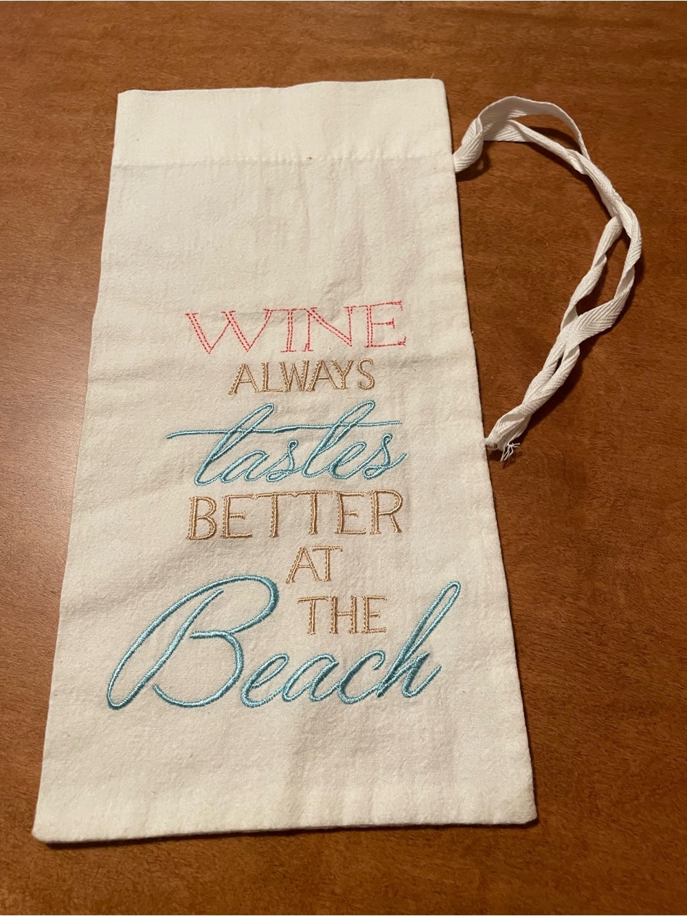 White Embroidered Wine Bag - "Wine Always Tastes Better at the Beach"